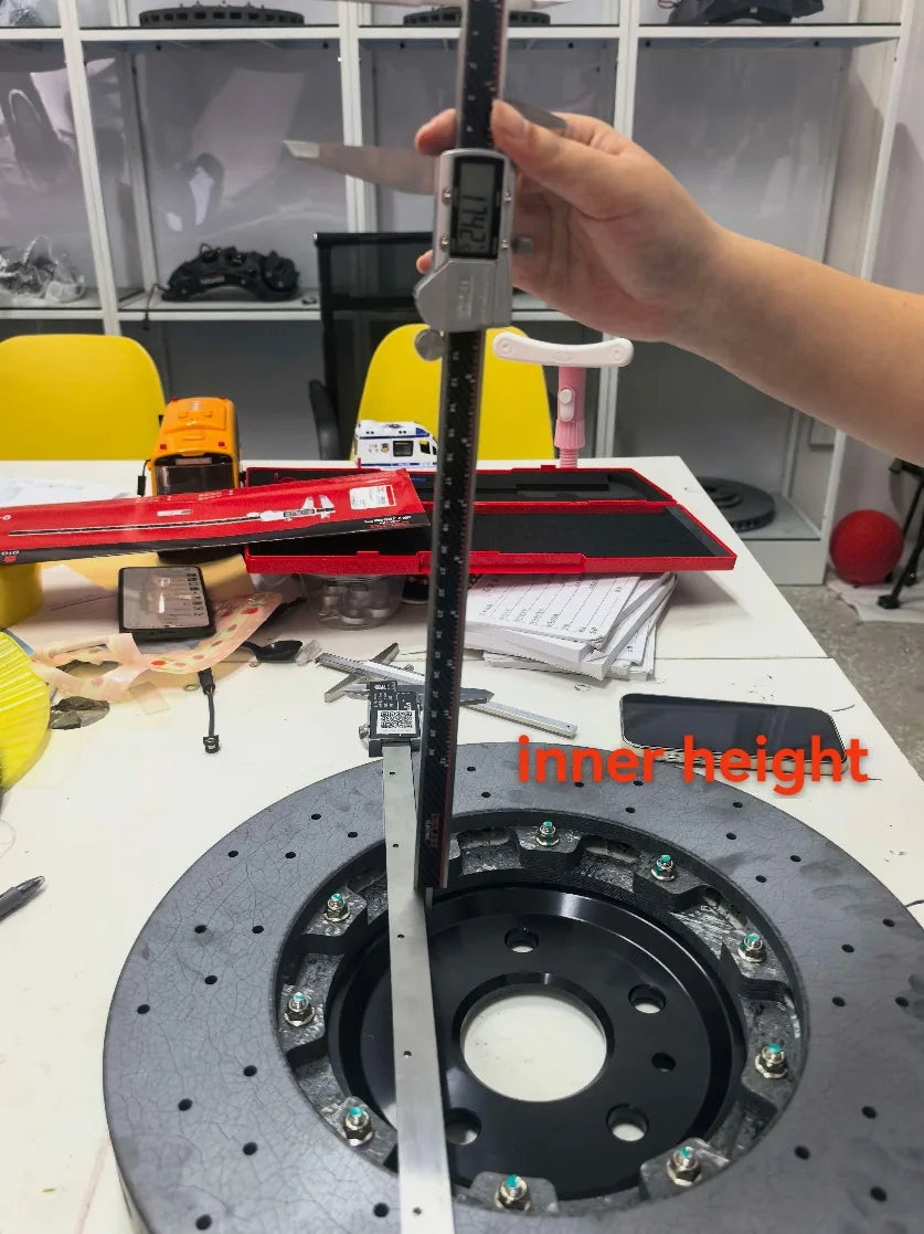 Reference bar and caliper positioned across the back of the rotor