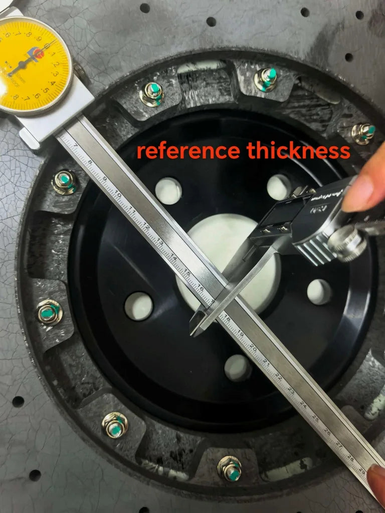 Rigid reference bar bridging the back of the rotor