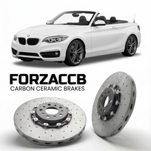 ForzaCCB direct OEM replacement carbon ceramic brake rotors for 2014 to 2021 BMW 2-Series Convertible F23 models, shown with a white BMW 2-Series Convertible car.