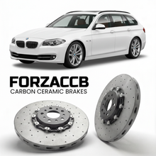 ForzaCCB direct OEM replacement carbon ceramic brake rotors for 2010 to 2017 BMW 5-Series Touring F11 models, shown with a white BMW 5-Series Touring car.