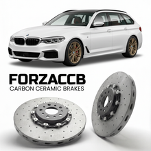 ForzaCCB direct OEM replacement carbon ceramic brake rotors for 2017 to 2023 BMW 5-Series Touring G31 models, shown with a white BMW 5-Series Touring car.