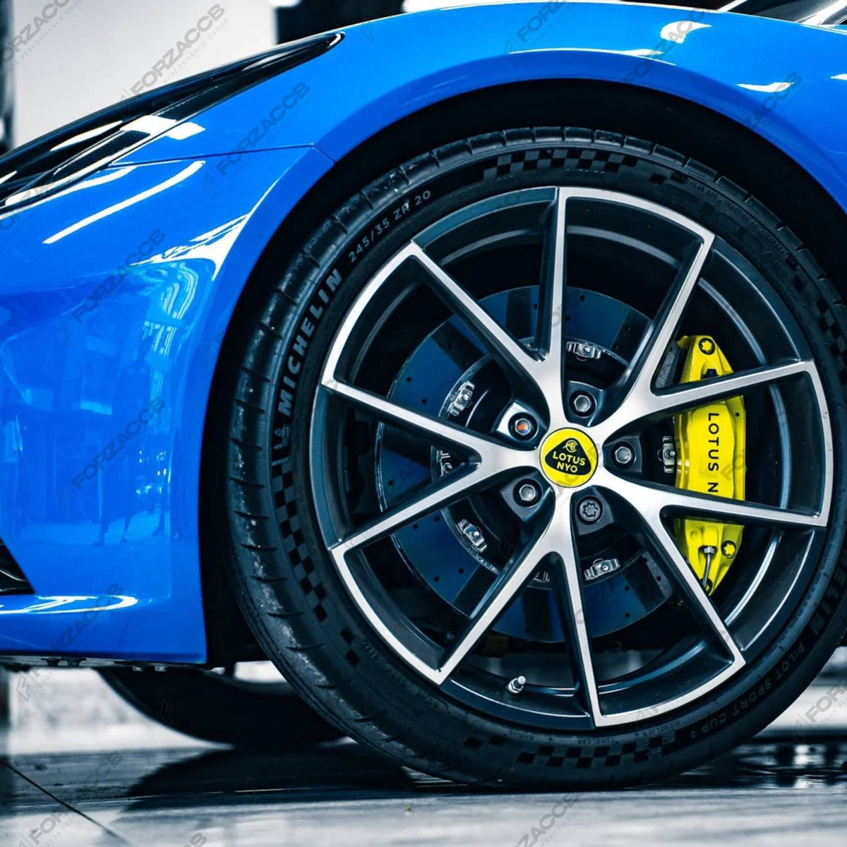 ForzaCCB carbon ceramic brake rotor paired with a bright orange Lamborghini Carboceramici brake caliper.