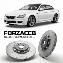 ForzaCCB direct OEM replacement carbon ceramic brake rotors for 2012 to 2018 BMW 6-Series Gran Coupe F06 models, shown with a white BMW 6-Series Gran Coupe car.
