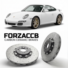 ForzaCCB direct OEM replacement carbon ceramic brake rotors for 2005 to 2008 Porsche 911 Carrera 4 997.1 models, shown with a white Porsche 911 Carrera 4 car.
