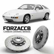 ForzaCCB direct OEM replacement carbon ceramic brake rotors for 1983 to 1986 Porsche 928 S models, shown with a white Porsche 928 S car.