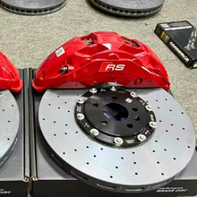ForzaCCB carbon ceramic brake rotor paired with a red Audi RS multi-piston brake caliper and Goodridge brake lines.