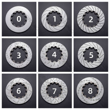 Collage of nine brake steel rotor drill and slot pattern variations, labeled 0 through 8.