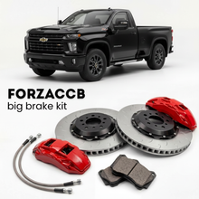 Black Chevrolet Silverado 2500 HD T1XX) Regular Cab Long Bed (2020-2023 (IV) shown above a ForzaCCB iron rotor big brake kit with 2x red 6-piston front calipers, 2x two-piece floating ventilated brake discs 380 mm, set of brake pads, and brake lines.