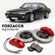 Black Ferrari 412 (1985-1989) shown above a ForzaCCB iron rotor big brake kit with 2x red 6-piston front calipers, 2x two-piece floating ventilated brake discs 380 mm, set of brake pads, and brake lines.