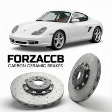 ForzaCCB direct OEM replacement carbon ceramic brake rotors for 1997 to 2004 Porsche Boxster 986 models, shown with a white Porsche Boxster car.