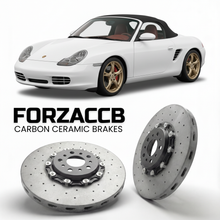 ForzaCCB direct OEM replacement carbon ceramic brake rotors for 2000 to 2004 Porsche Boxster S 986 models, shown with a white Porsche Boxster S car.