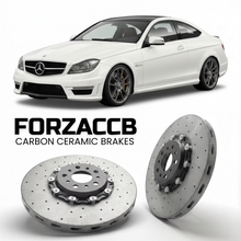 ForzaCCB direct OEM replacement carbon ceramic brake rotors for 2011 to 2015 Mercedes-Benz C 63 AMG Coupé C204 models, shown with a white Mercedes-Benz C 63 AMG Coupé car.