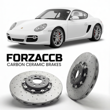 ForzaCCB direct OEM replacement carbon ceramic brake rotors for 2005 to 2012 Porsche Cayman 987 models, shown with a white Porsche Cayman car.