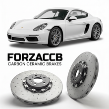 ForzaCCB direct OEM replacement carbon ceramic brake rotors for 2017 and newer Porsche Cayman 982 models, shown with a white Porsche Cayman car.