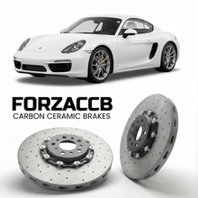 ForzaCCB direct OEM replacement carbon ceramic brake rotors for 2013 to 2016 Porsche Cayman S models, shown with a white Porsche Cayman S car.