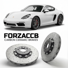 ForzaCCB direct OEM replacement carbon ceramic brake rotors for 2017 and newer Porsche Cayman S 982 models, shown with a white Porsche Cayman S car.