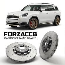 ForzaCCB direct OEM replacement carbon ceramic brake rotors for 2023 and newer Mini Countryman U25 models, shown with a white Mini Countryman car.