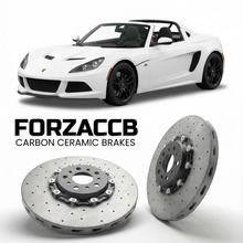 ForzaCCB direct OEM replacement carbon ceramic brake rotors for 2015 to 2016 Zenos E10 models, shown with a white Zenos E10 car.