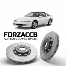 ForzaCCB direct OEM replacement carbon ceramic brake rotors for 1990 to 2011 Mitsubishi Eclipse models, shown with a white Mitsubishi Eclipse car.