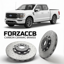 ForzaCCB direct OEM replacement carbon ceramic brake rotors for 2020 to 2023 Ford F-Series F-100/F-150 Ford F-Series F-150 XIV SuperCab models, shown with a white Ford F-Series F-100/F-150 car.