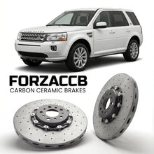 ForzaCCB direct OEM replacement carbon ceramic brake rotors for 2010-2012) Land Rover Freelander II (facelift 2010 models, shown with a white Land Rover Freelander car.