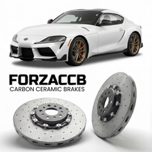 ForzaCCB direct OEM replacement carbon ceramic brake rotors for 2019 and newer Toyota GR Supra A90 models, shown with a white Toyota GR Supra car.