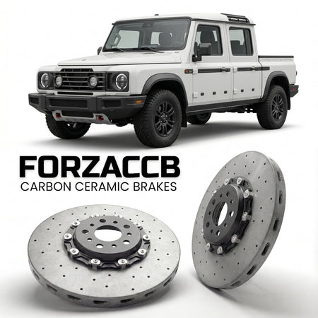 ForzaCCB direct OEM replacement carbon ceramic brake rotors for 2023 and newer INEOS Grenadier Quartermaster models, shown with a white INEOS Grenadier car.