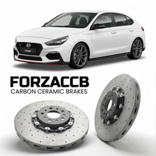 ForzaCCB direct OEM replacement carbon ceramic brake rotors for 2019 to 2026 Hyundai i30 Fastback N models, shown with a white Hyundai i30 Fastback N car.