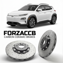 ForzaCCB direct OEM replacement carbon ceramic brake rotors for 2019 to 2026 Hyundai Kona Electric models, shown with a white Hyundai Kona Electric car.