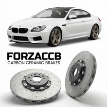 ForzaCCB direct OEM replacement carbon ceramic brake rotors for 2012 to 2018 BMW M6 Coupe F13 models, shown with a white BMW M6 Coupe car.