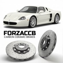 ForzaCCB direct OEM replacement carbon ceramic brake rotors for 2004 to 2005 Maserati MC12 models, shown with a white Maserati MC12 car.