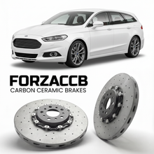 ForzaCCB direct OEM replacement carbon ceramic brake rotors for 2019-2021) Ford Mondeo IV Hatchback (facelift 2019 models, shown with a white Ford Mondeo car.