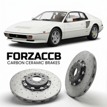 ForzaCCB direct OEM replacement carbon ceramic brake rotors for 1982 to 1985 Ferrari Mondial Quattrovalvole models, shown with a white Ferrari Mondial Quattrovalvole car.