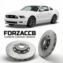 ForzaCCB direct OEM replacement carbon ceramic brake rotors for 2009-2012) Ford Mustang V (facelift 2009 models, shown with a white Ford Mustang car.