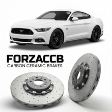 ForzaCCB direct OEM replacement carbon ceramic brake rotors for 2017-2023) Ford Mustang VI (facelift 2017 models, shown with a white Ford Mustang car.