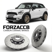 ForzaCCB direct OEM replacement carbon ceramic brake rotors for 2013 to 2016 Mini Paceman R61 models, shown with a white Mini Paceman car.