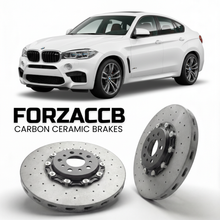 ForzaCCB direct OEM replacement carbon ceramic brake rotors for 2015 to 2019 BMW X6 M F86 models, shown with a white BMW X6 M car.